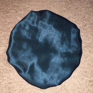 A blue satin cap